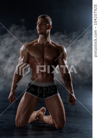 Bodybuilder Posing Handsomely With Athletic Power On Black Background Photo  Of Muscular Male Fitness Picture And HD Photos | Free Download On Lovepik