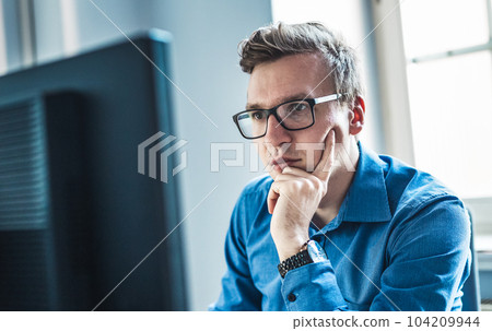 Remote work and modrn conectivity. Virtual meeting with many participents online. Webinar. Businessman talking online with employees via video connection Remote work and modrn conectivity. Virtual meeting with many participents online. Webinar. Businessman talking online with employees via video connection 104209944