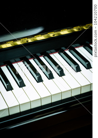 Piano keys close-up selective focus shallow DOF Piano keys close-up selective focus shallow DOF 104210700