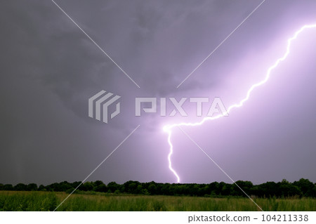 Ray. Lightning storm. Lightning bolt storm. Fork lightning striking. Lightning thunderstorm flash over the night sky. Concept on topic weather, cataclysms (hurricane, Typhoon, tornado, storm). 104211338