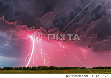 Ray. Lightning storm. Lightning bolt storm. Fork lightning striking. Lightning thunderstorm flash over the night sky. Concept on topic weather, cataclysms (hurricane, Typhoon, tornado, storm). Ray. Lightning storm. Lightning bolt storm. Fork lightning striking. Lightning thunderstorm flash over the night sky. Concept on topic weather, cataclysms (hurricane, Typhoon, tornado, storm). 104211373
