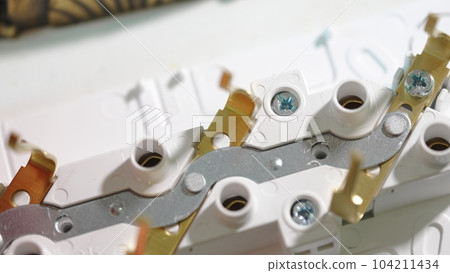 Disassembled electrical outlet. electrician services Disassembled electrical outlet. electrician services 104211434