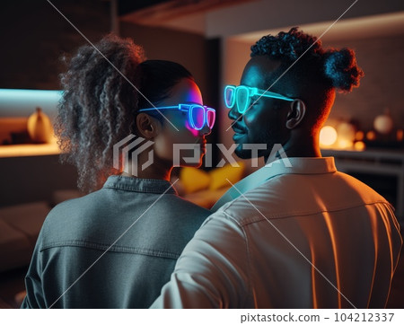 Beautiful Multiethnic Couple in Casual Outfits and Futuristic Neon Glowing Glasses, Dance and Have a Party at Home Beautiful Multiethnic Couple in Casual Outfits and Futuristic Neon Glowing Glasses, Dance and Have a Party at Home 104212337