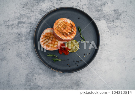 Grilled salmon with mozzarella Grilled salmon with mozzarella 104213814