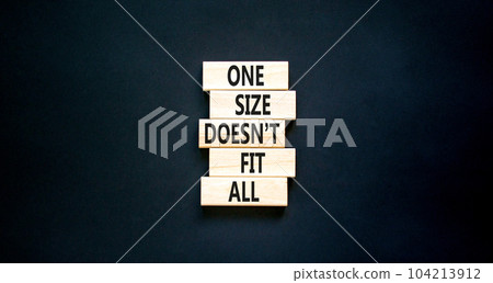 One size does not fit all symbol. Concept words One size does not fit all on wooden blocks. Beautiful black table black background. One size does not fit all business concept. Copy space. One size does not fit all symbol. Concept words One size does not fit all on wooden blocks. Beautiful black table black background. One size does not fit all business concept. Copy space. 104213912