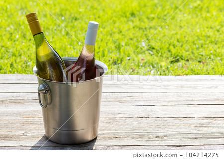 White and rose wine bottles 104214275