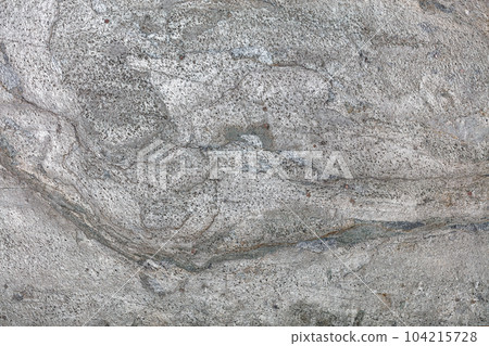 The gray texture of lava after cooling and turning into stone. The gray texture of lava after cooling and turning into stone. 104215728