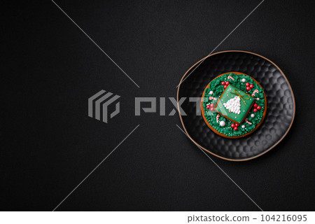 Beautiful Christmas or New Year colorful homemade gingerbread cookies Beautiful Christmas or New Year colorful homemade gingerbread cookies 104216095