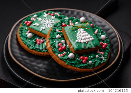 Beautiful Christmas or New Year colorful homemade gingerbread cookies Beautiful Christmas or New Year colorful homemade gingerbread cookies 104216115