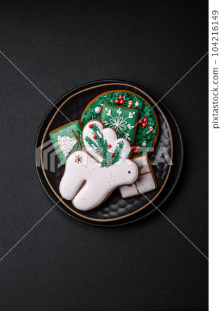 Beautiful Christmas or New Year colorful homemade gingerbread cookies Beautiful Christmas or New Year colorful homemade gingerbread cookies 104216149