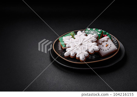Beautiful Christmas or New Year colorful homemade gingerbread cookies 104216155