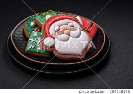 Beautiful Christmas or New Year colorful homemade gingerbread cookies 104216166