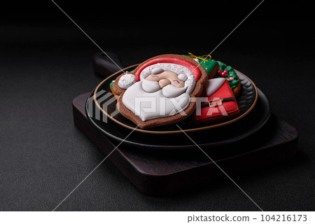 Beautiful Christmas or New Year colorful homemade gingerbread cookies 104216173