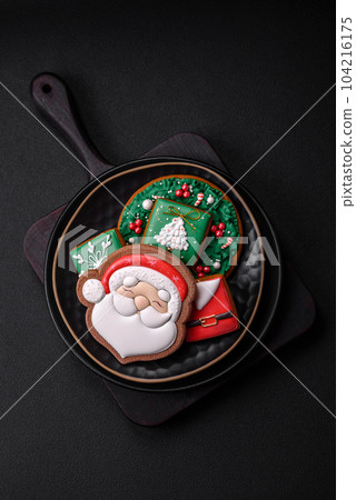 Beautiful Christmas or New Year colorful homemade gingerbread cookies Beautiful Christmas or New Year colorful homemade gingerbread cookies 104216175