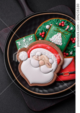 Beautiful Christmas or New Year colorful homemade gingerbread cookies Beautiful Christmas or New Year colorful homemade gingerbread cookies 104216180