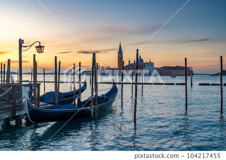 View of San Giorgio Maggiore Island with gondolas from San Marco 104217455