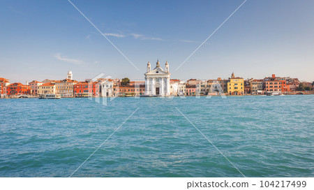 Giudecca canal in Venice with St. Mary of the Rosary church. Giudecca canal in Venice with St. Mary of the Rosary church. 104217499
