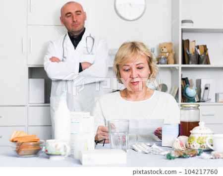 MAture woman and doctor 104217760
