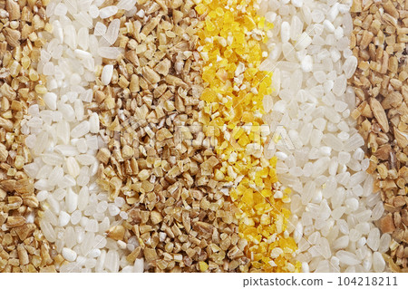 Various groats, cereals. Different types of groats as a background. Various groats, cereals. Different types of groats as a background. 104218211