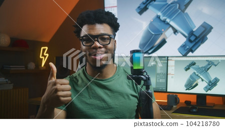 African American 3D designer records video about 3D animation African American 3D designer records video about 3D animation 104218780