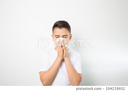 white boy gets sick and blows his nose into a white napkin 104219932