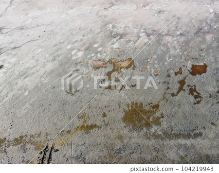 Dry muddy soil surface coverd by salt for background texture 104219943