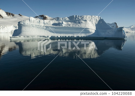 Floating icebergs in Paradise Bay, Antartica. 104220088