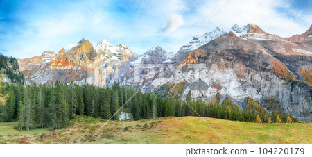 Incredible autumn view of Oeschinen valley and Bluemlisalp summit. Incredible autumn view of Oeschinen valley and Bluemlisalp summit. 104220179