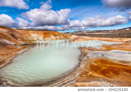 Breathtaking landscape of Acid hot lake with turquoise water in the geothermal valley Leirhnjukur. 104220180