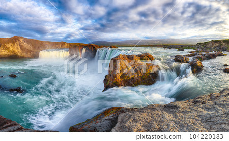 Breathtaking landscape scene of powerful Godafoss waterfall. Breathtaking landscape scene of powerful Godafoss waterfall. 104220183