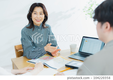 Female in her 50s business scene 104220358