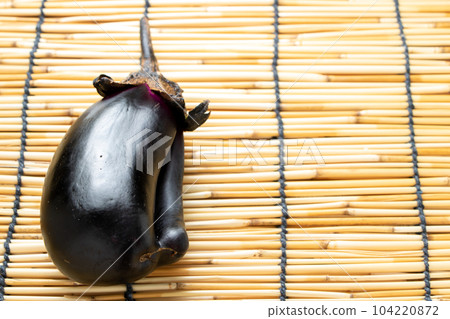 Eggplants harvested in the home garden. Summer image with background blinds. Eggplants harvested in the home garden. Summer image with background blinds. 104220872