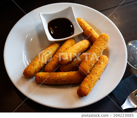 Cheese sticks with mozzarella Cheese sticks with mozzarella 104223085