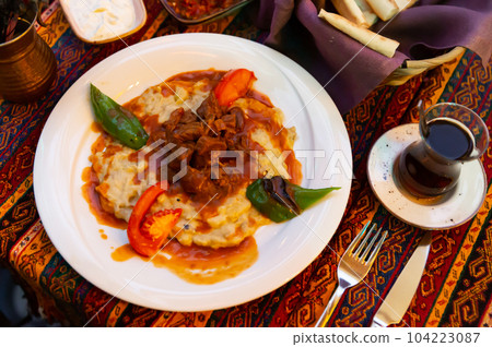 Hunkar begendi made with eggplant and meat Hunkar begendi made with eggplant and meat 104223087