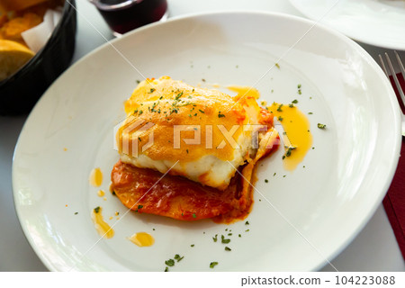 Closeup of codfish backed with sauces and served, nobody Closeup of codfish backed with sauces and served, nobody 104223088