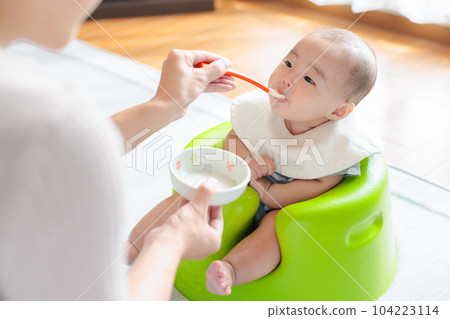 Early baby food Baby eating porridge Early baby food Baby eating porridge 104223114