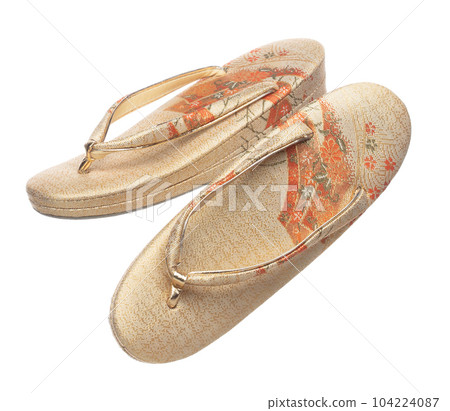 Tabis footwear shoes Japanese Traditional Komono equipment fly in air. Tabis footwear shoes Japanese Traditional Komono is beautiful clothes for ceremony event. White background isolated 104224087