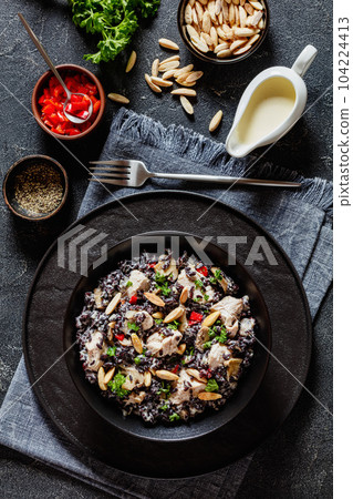 black rice with cream, chicken, mushrooms, almonds 104224413