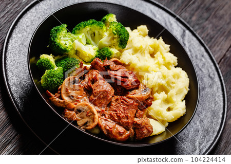 beef mushrooms stew with mashed potato and salad beef mushrooms stew with mashed potato and salad 104224414