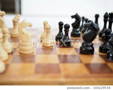 Wooden chess with blurred background 104229539