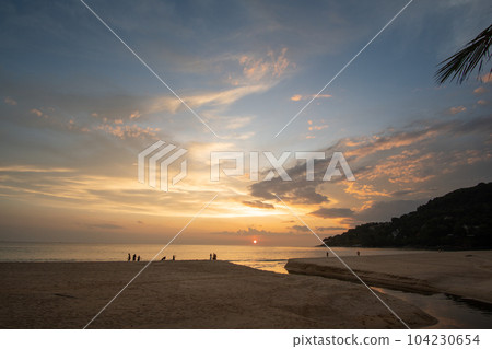 aerial view amazing sky above Karon beach Phuket at colorful sunset. aerial view amazing sky above Karon beach Phuket at colorful sunset. 104230654