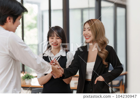 Business people handshake. Successful business person and client handshaking after good deal. Finishing up meeting concept 104230947