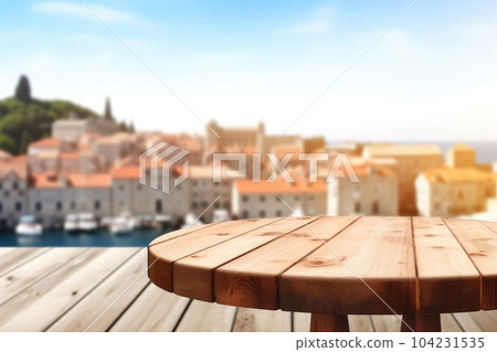The empty wooden table top with blur background of the old town Dubrovnik . Exuberant. The empty wooden table top with blur background of the old town Dubrovnik . Exuberant. 104231535