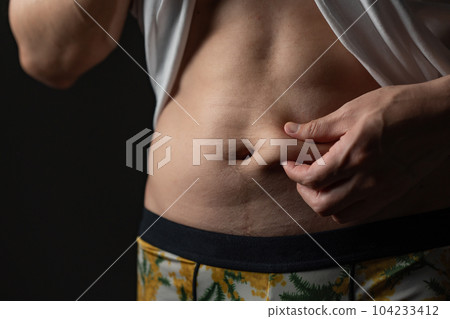 Men pinching their belly fat Diet Men pinching their belly fat Diet 104233412