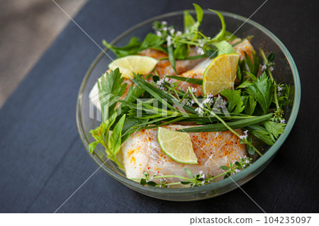 Cooking a spicy fish dish 104235097