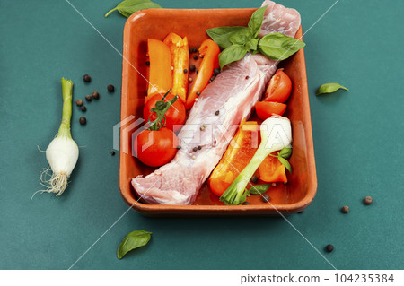 Uncooked raw meat prepared for cooking. Uncooked raw meat prepared for cooking. 104235384
