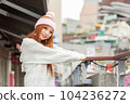 Asian American Woman in beanie cap 104236272