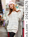 Asian American Woman in beanie cap 104236276