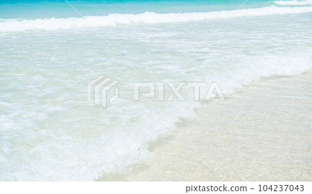 Sea Ocean on Beach Background,White Sand and Wave Blue Water Shore Summer Tropical Paradise Nature Beauty Seascape,Island at Coast,Tourism Vacation Relax Travel Holidays. 104237043
