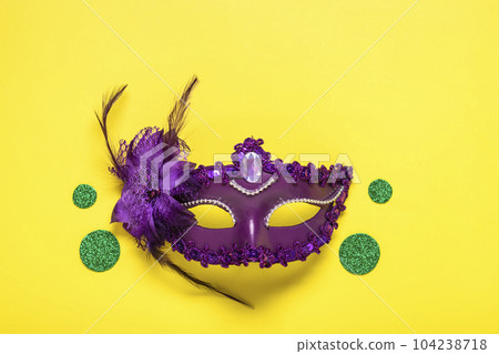 Mardi gras lettering. Congratulation card with violet mask on yellow background Top view 2023 Mardi Gras Parade Schedule Mockup Copy space. Mardi gras lettering. Congratulation card with violet mask on yellow background Top view 2023 Mardi Gras Parade Schedule Mockup Copy space. 104238718